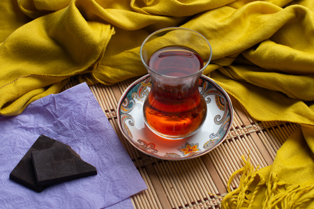 Homemade oatmeal cookies with a cup of tea on old wooden background, A cup of tea with raisin, a cup of tea with chocolateの写真素材
