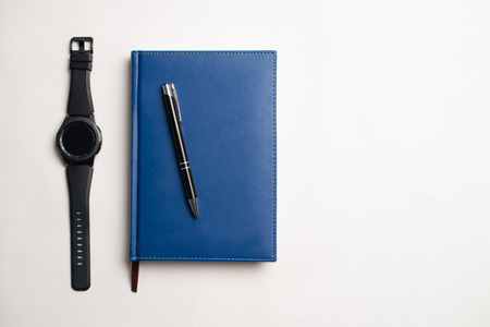 Notebook with glasses and pen, Book with glasses, Blue notebook with glasses, Book with cup of tea, working with glasses and pen, write to notebookの写真素材