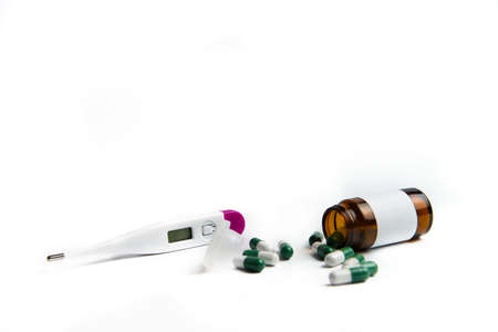 Coronavirus 2019-nCoV outbreak. Pills and syringe on a white isolated backgroundの写真素材