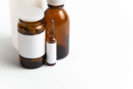 Blank brown glass drug bottle isolated on white backgroundの写真素材