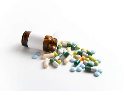 Coronavirus 2019-nCoV outbreak. Pills and drug, care during illness. White isolated background.の写真素材