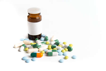 Coronavirus 2019-nCoV outbreak. Pills and drug, care during illness. White isolated background.の写真素材