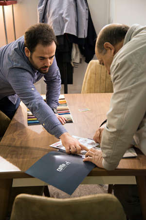 Customers and sellers negotiate sales at Istanbul Furniture Fair in istanbul, Turkey, February 8 2020のeditorial素材
