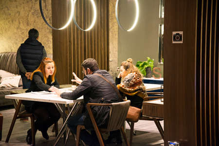 Customers and sellers negotiate sales at Istanbul Furniture Fair in istanbul, Turkey, February 8...