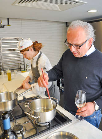 Students at Istanbul Cookery School learn how to cook a meal by taking masterclass training from chefs in Istanbul, Turkey. 20 September 2019のeditorial素材