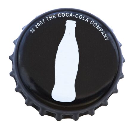 Tel-Aviv, Israel - February, 1st 2010: A Coca Cola Zero black metal cap, used to seal glass bottles of the Coca Cola drink. Shot from a slightly high angle, isolated on white background.のeditorial素材