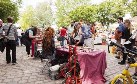 Berlin, Germany - June 10th, 2012: Large amount of people walking in the Sunday flee market held at...