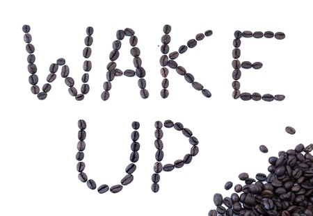 The phrase Wake Up written with coffee beans.の写真素材
