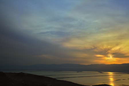 A view at the southern part of the Dead Sea from the mountains to its east, at the time of a magical sunrise.の写真素材