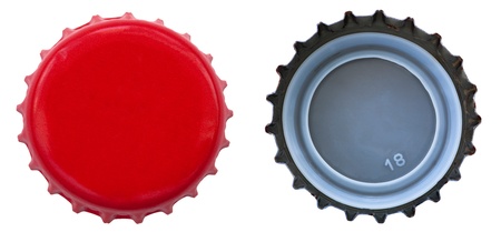 Both sides of a red metal bottle cap. One of the top side and one of the bottom side. Isolated on...