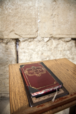 The biblical book of psalms resting on a pedistal in front of the wailing wall in the old city of Jerusalem, Israel.の写真素材