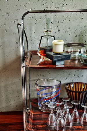 Still life shot of a vintage retro old fashioned liquor station at a house living room.の写真素材