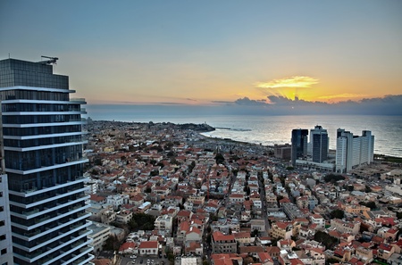 A view to the south-west at sunset time in Tel-Aviv.An HDR photo.DEAR INSPECTOR: The 'over processed' look here was done ON PURPOSE using the fmaous HDR techinque, for aestheric reasons. Please take under consideration.Thank you!Eldad Carin.の写真素材