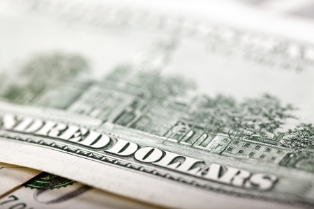 An extreme close up of the reverse side of a 100 US$ money note, with very shallow depth of field....