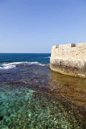 Part of the old town of Acco  Israel  city wall rising above the Mediterranean sea の写真素材