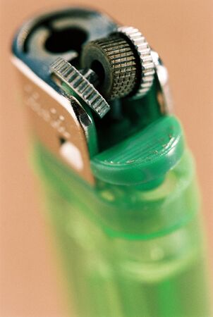 Malfunctioning Green Used Lighter close up macro.の写真素材
