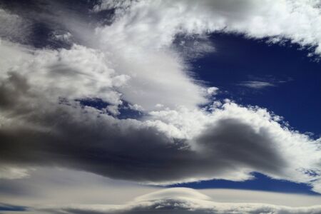 Cloudscape of smeared, featherlike, clouds.