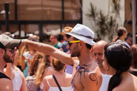 Tel-Aviv, Israel - June 7, 2013: People partying at the annual gay parade in the streets of Tel-Aviv.のeditorial素材