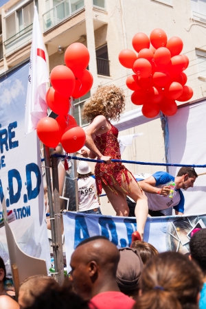 Tel-Aviv, Israel - June 7, 2013: People partying at the annual gay parade in the streets of Tel-Aviv.のeditorial素材
