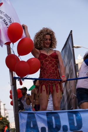 Tel-Aviv, Israel - June 7, 2013: People partying at the annual gay parade in the streets of Tel-Aviv.のeditorial素材