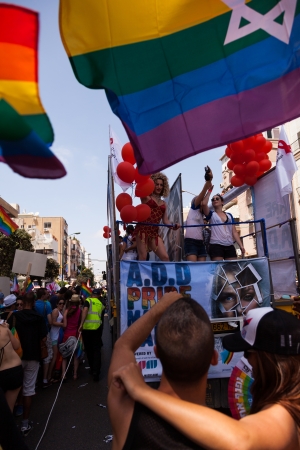Tel-Aviv, Israel - June 7, 2013: People partying at the annual gay parade in the streets of Tel-Aviv.のeditorial素材