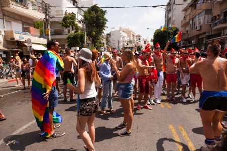Tel-Aviv, Israel - June 7, 2013: People partying at the annual gay parade in the streets of Tel-Aviv.のeditorial素材