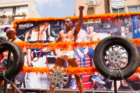 Tel-Aviv, Israel - June 7, 2013: People partying at the annual gay parade in the streets of Tel-Aviv.のeditorial素材