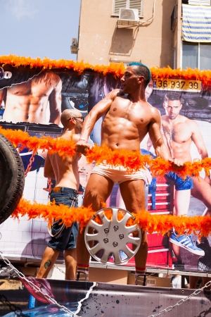 Tel-Aviv, Israel - June 7, 2013: People partying at the annual gay parade in the streets of Tel-Aviv.のeditorial素材