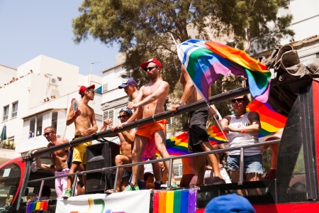 Tel-Aviv, Israel - June 7, 2013: People partying at the annual gay parade in the streets of Tel-Aviv.のeditorial素材