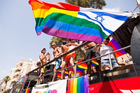 Tel-Aviv, Israel - June 7, 2013: People partying at the annual gay parade in the streets of Tel-Aviv.のeditorial素材