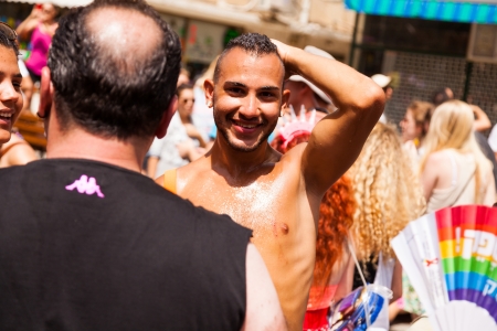 Tel-Aviv, Israel - June 7, 2013: People partying at the annual gay parade in the streets of Tel-Aviv.のeditorial素材