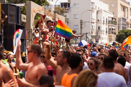 Tel-Aviv, Israel - June 7, 2013: People partying at the annual gay parade in the streets of Tel-Aviv.のeditorial素材