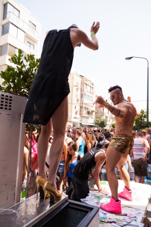 Tel-Aviv, Israel - June 7, 2013: People partying at the annual gay parade in the streets of Tel-Aviv.のeditorial素材