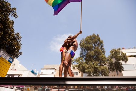 Tel-Aviv, Israel - June 7, 2013: People partying at the annual gay parade in the streets of Tel-Aviv.のeditorial素材