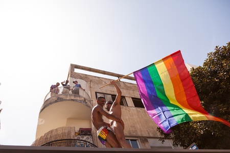 Tel-Aviv, Israel - June 7, 2013: People partying at the annual gay parade in the streets of Tel-Aviv.のeditorial素材