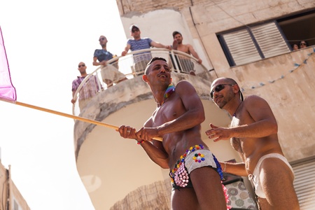 Tel-Aviv, Israel - June 7, 2013: People partying at the annual gay parade in the streets of Tel-Aviv.のeditorial素材