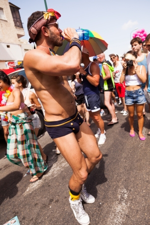 Tel-Aviv, Israel - June 7, 2013: People partying at the annual gay parade in the streets of Tel-Aviv.のeditorial素材