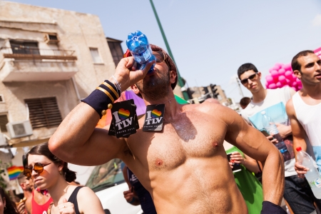 Tel-Aviv, Israel - June 7, 2013: People partying at the annual gay parade in the streets of Tel-Aviv.のeditorial素材