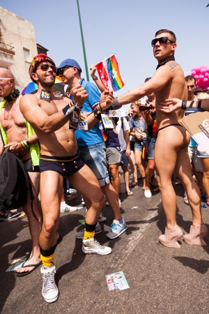 Tel-Aviv, Israel - June 7, 2013: People partying at the annual gay parade in the streets of Tel-Aviv.のeditorial素材