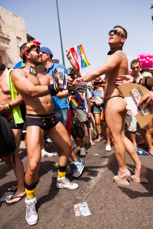 Tel-Aviv, Israel - June 7, 2013: People partying at the annual gay parade in the streets of Tel-Aviv.のeditorial素材