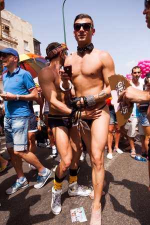 Tel-Aviv, Israel - June 7, 2013: People partying at the annual gay parade in the streets of Tel-Aviv.のeditorial素材
