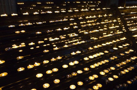 Rows of praying candles in Viennaâs Cathedral.の写真素材