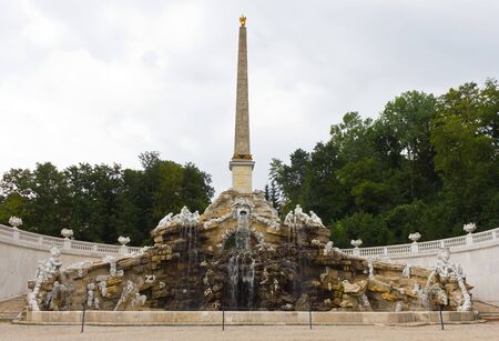 Vienna, Austria, July 23, 2011 - A tall obelisk erected on top of a monumental cascade in Schönbrunn Palaceのeditorial素材