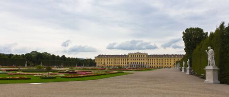 Vienna, Austria, July 23, 2011 - Panoramic view of the Schönbrunn Palace surrounded by beautiful gardens and sculpturesのeditorial素材