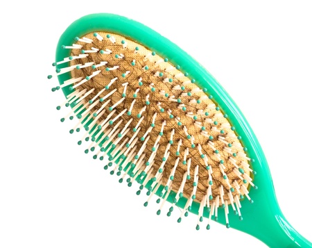 Hair brush full of hair, concept for hair loss, isolated on white.の写真素材