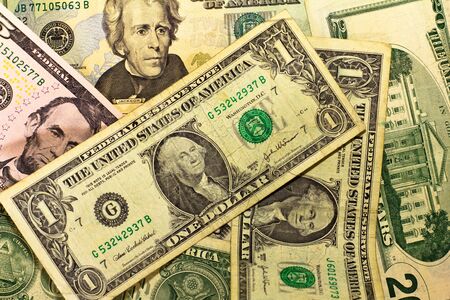 Money pile with different dollar bills. Concept for wealthの写真素材