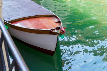 Detail of a boat in a canal in Venice, Italy.の写真素材