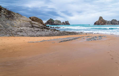 Lonely beach in Cantabria full of cliffs.の写真素材