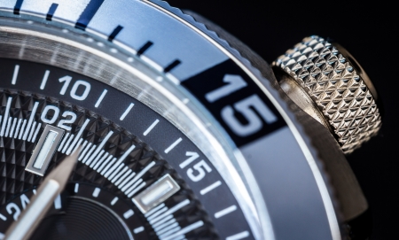Detail of a luxury watch on black background. Selective focus, shallow depth of field.の写真素材