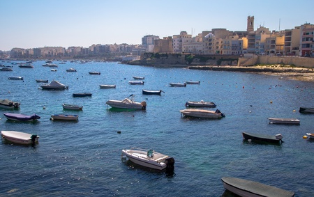 St Pauls Bay in Malta full of boats on turquoise water の写真素材